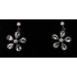 A boxed pair of yellow gold, diamond and faceted blue topaz flower-head earrings, L.1.5cm, 2.5g