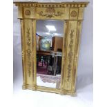An early 19th century gilt wood pier mirror, with shell carving, 129 x 95cm