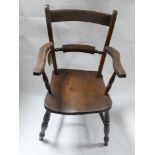 A late 19th century oak desk chair