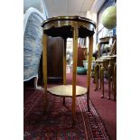 An early 20th century French walnut lamp table, with floral parquetry inlay and gilt metal mounts,