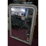 An early 20th century cream painted mirror with ghosted plate, 105 x 75cm