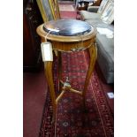 An early 20th century French walnut jardiniere stand with marble top, H.93cm