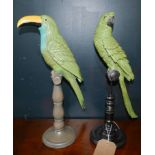 A resin parrot and toucan on perches, H.44cm (2)