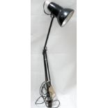 A vintage Herbert Terry wall mounted angle poise lamp