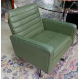 A mid 20th century green vinyl swivel armchair