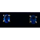 A boxed pair of sterling silver and blue apatite stud earrings, 5 x 4mm, 1.1g