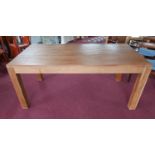 A contemporary teak dining table, H.78 W.180 D.90cm