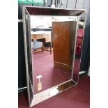 A contemporary mirror with bevelled plates, 124 x 92cm