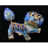 A Chinese silver-gilt and hand-enamelled brooch depicting a lion with outstretched paw, 5 x 6cm, 20g