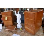 A pair of early 20th century oak pedestal chests of three drawers, raised on plinth bases, H.63 W.35