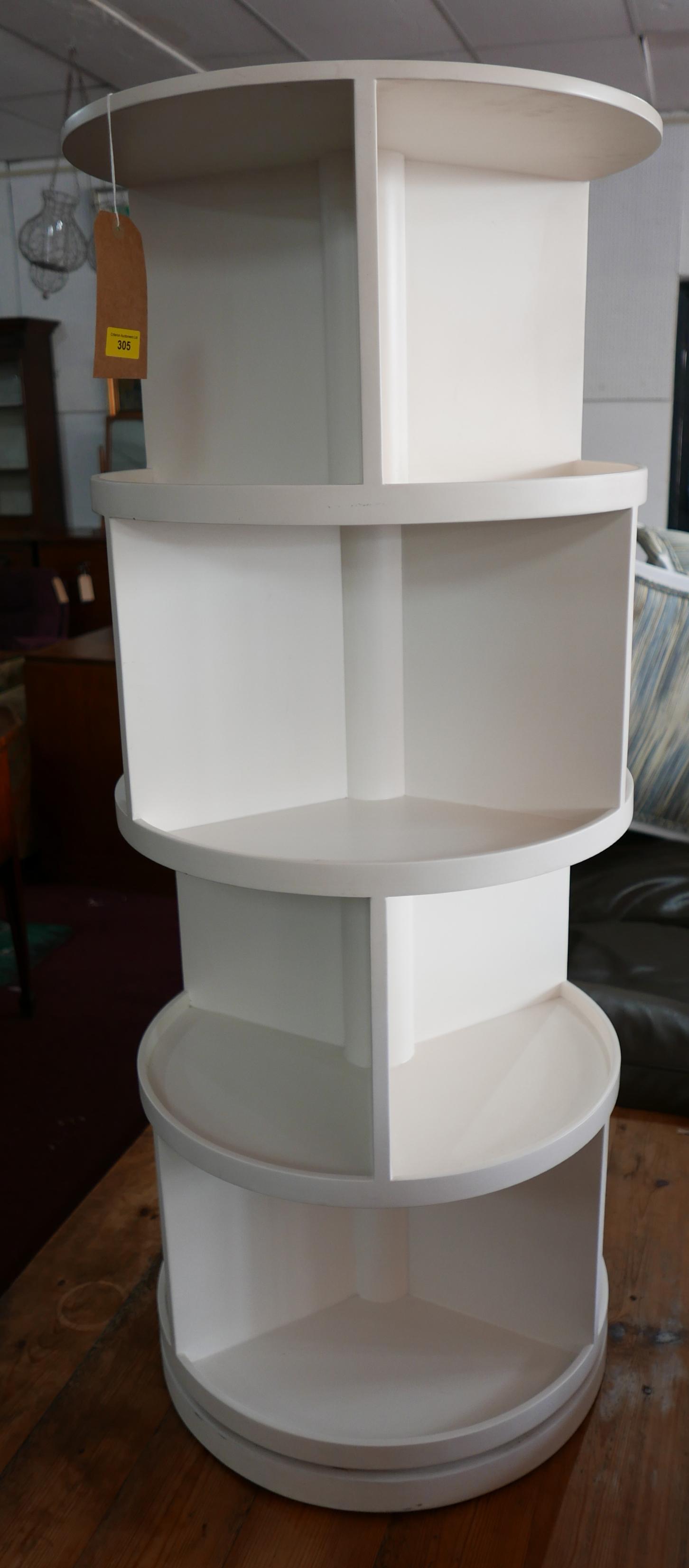 A contemporary revolving display stand