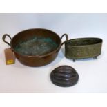 A copper jelly mould, makers mark to base, together with a copper pan and brass planter with