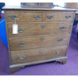 A Georgian oak chest, two short over three long drawers, raised on bracket feet, H.95 W.96 D.57cm