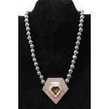 A sterling silver faceted citrine and haematite beaded necklace to a sterling silver clasp, L: 40cm,