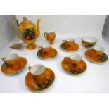 A Phoenix China Czechoslovakia coffee set, decorated with fruit and with gilt rims, to include a hot