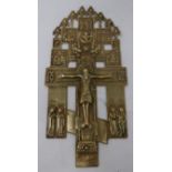 A Russian polished brass icon depicting the crucifix with selected Biblical scenes above, having