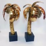 A pair of Maison Jansen style gilt sheet metal palm trees, H.110cm