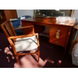 A mid 20th century Gordon Russel mahogany desk, H.76 W.139 D.76cm, with original receipt from