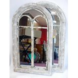 A pair of distressed painted arched garden mirrors, 96 x 55cm