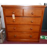 A Victorian mahogany chest, two short over three long drawers, raised on bun feet, H.112 W.110 D.
