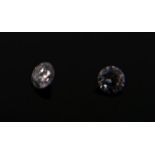 Boxed 2 loose round brilliant cut diamonds of 0.05 carats each, colour G