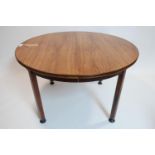 A mid 20th century Danish exotic hardwood dining table with two extra leaves, H.74 W.210 D.120cm,