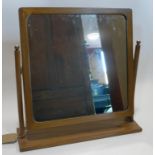 A mid 20th century teak vanity swing mirror, H.59 W.60 D.15cm