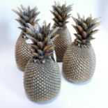 Four gilt resin pineapples