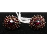 A pair of antique, silver-gilt, garnet cluster screw-back earrings, Each stamped 'HGR, 830S',