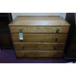 A light oak chest of four drawers, raised on plinth base, H.76 W.92 D.46cm