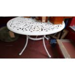 A cast aluminium garden table