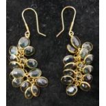 A pair of 14ct yellow gold and faceted sapphire grape-cluster earrings, each earring composed of