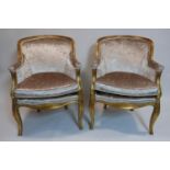 A pair of Oficina Inglesa gilt wood chairs, with velour upholstery, raised on cabriole legs