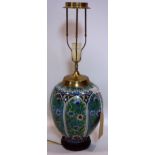 An early 20th century Turkish blue glazed vase converted to a lamp, with vignettes of flowers, on
