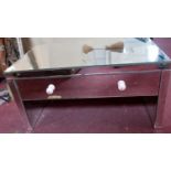 A contemporary mirrored coffee table with single drawer, H.45 W.90 D.55cm