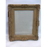 An ornate part gilt wood picture frame, 72 x 59cm