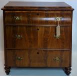 A 19th century continental walnut chest of three drawers, raised on turned feet, H.90 W.95 D.49cm