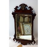 A Georgian mahogany fret work mirror with bevelled plate, 74 x 42cm