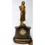 An Art Nouveau style gilt metal mantel clock, with gilt and resin girl finial, white dial with