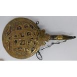 A Middle Eastern brass powder flask, with scrolling decoration, H.21cm