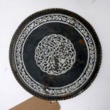 A Middle Eastern bronze and white metal plaque, decorated with geometric design, Diameter 20cm