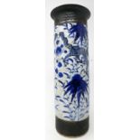 A late 19th century Chinese blue and white cylindrical vase, decorated with dragons amongst stylised