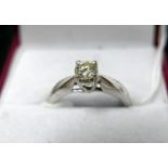 A 9ct white gold solitaire diamond ring, in box, 0.25 carats