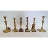 Six brass candlesticks of varying size and form, H.27cm (tallest)