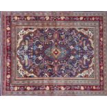 A North West Persian Mahal carpet, double pendent medallion on a sapphire field, complimented by a