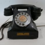 A vintage telephone by the Reliance telephone company