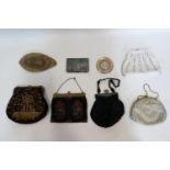 A collection of ladies clutches, together with a vintage Middle Eastern hat, a plated compact with