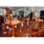 A set of 12 Chinese style hardwood dining chairs, to include two carvers, by Century Furniture of