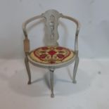 A painted arts and crafts chair with tapestry seat