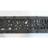 A 20th century South East Asian carved hardwood frieze, 19 x 92cm
